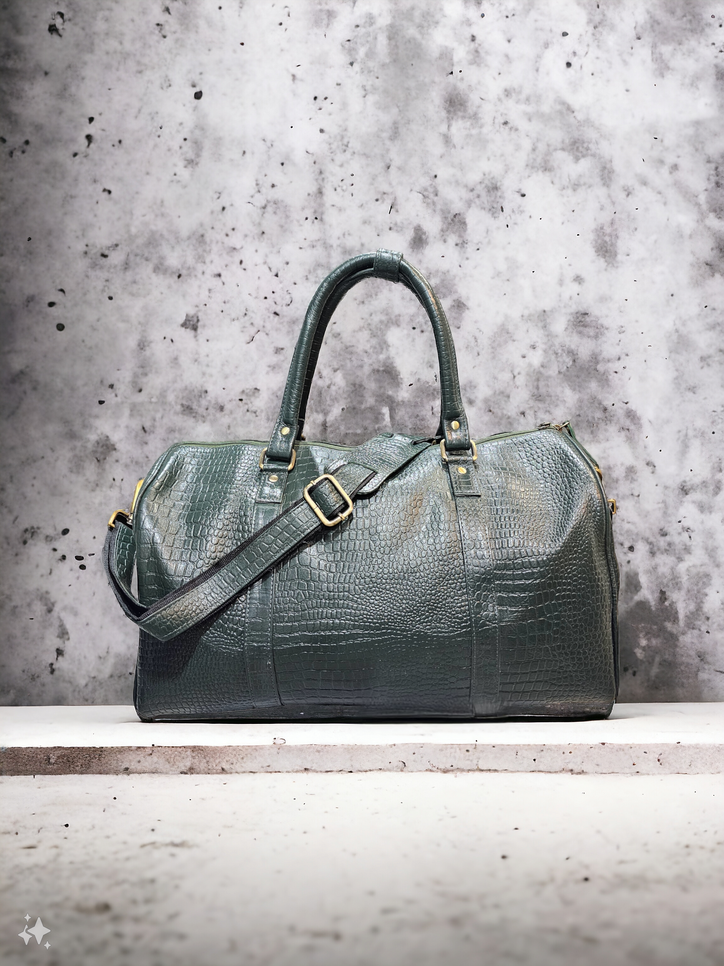 Hunter green leather duffel bag with croco print, adjustable shoulder strap, and multiple compartments. Compact yet spacious, perfect for short trips and daily use.
