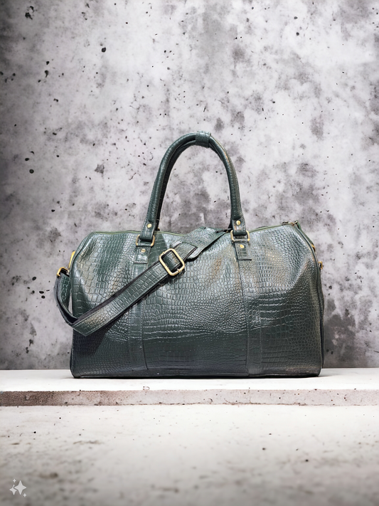 Hunter green leather duffel bag with croco print, adjustable shoulder strap, and multiple compartments. Compact yet spacious, perfect for short trips and daily use.