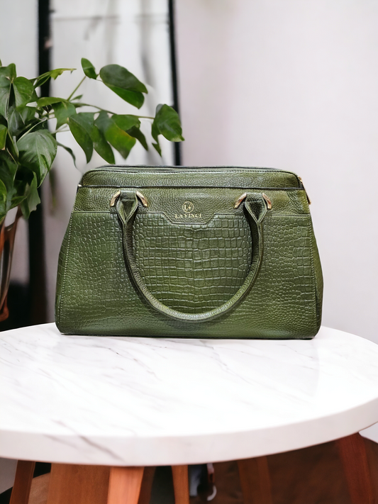 Green leather handbag with croco print, detachable sling, and multiple compartments. Stylish, spacious, and perfect for everyday use.